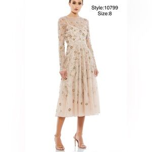 Beaded illusion high neck long sleeve A line gown